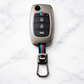 Metal Silicone Key Cover Compatible for Mahindra Alturas G4, XUV 300. ( 3 Button Flip Key)