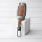 Metal Leather Brown Car Key Cover Compatible For Mahindra Alturas G4, XUV 300. ( 3 Button Flip Key)